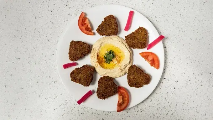 Chicken shawarma strips with fries and garlic sauce at Original Shawarma Calgary